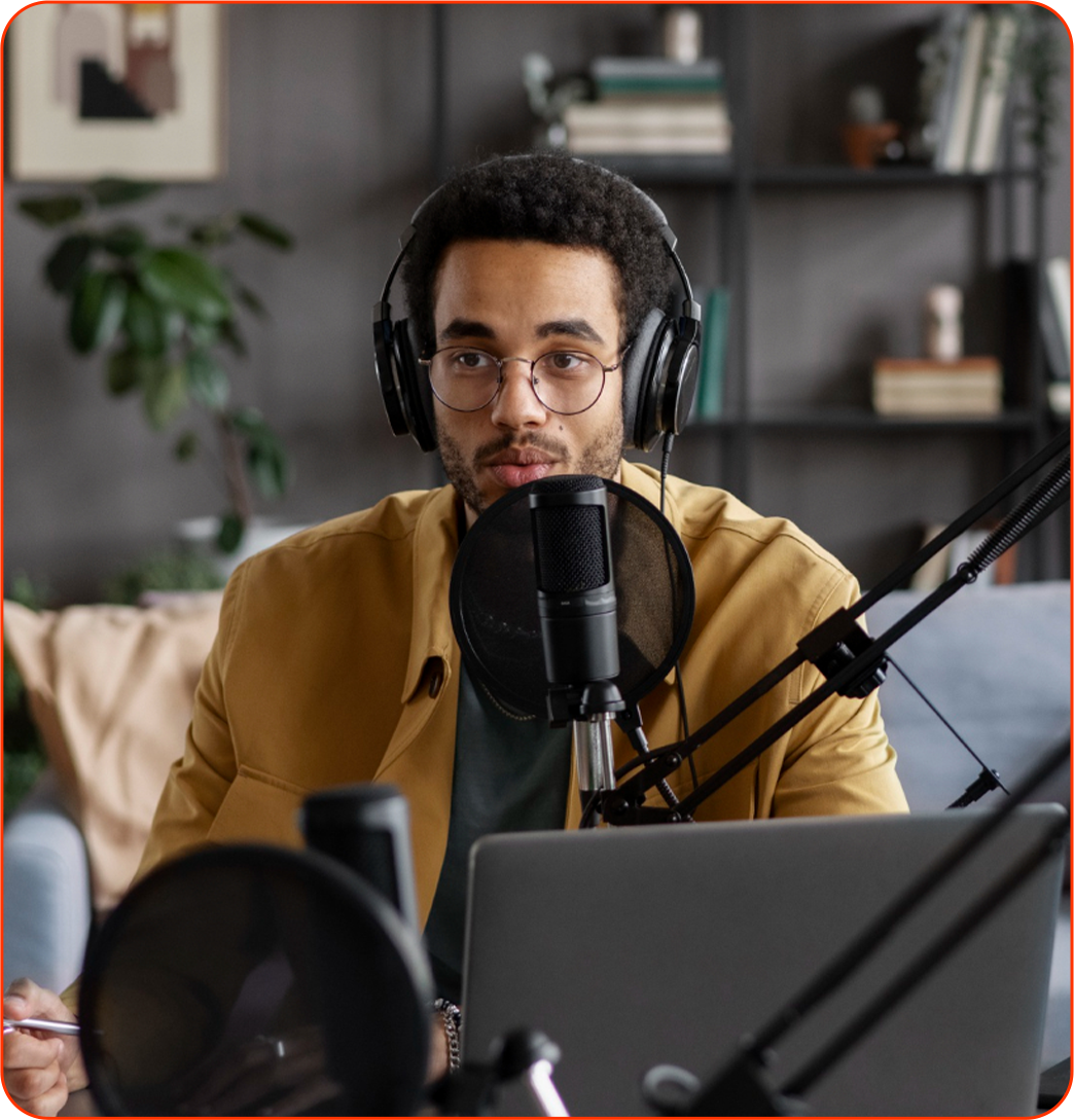 Podcast creator recording with studio microphone and headphones